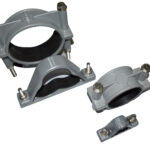 Various sizes of OMEGA cable cleats and clamps, designed for securing electrical cables in different configurations.