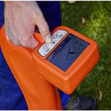 A UT 9000 pipe and cable locator device with receiver and transmitter, featuring a sleek design and advanced display.